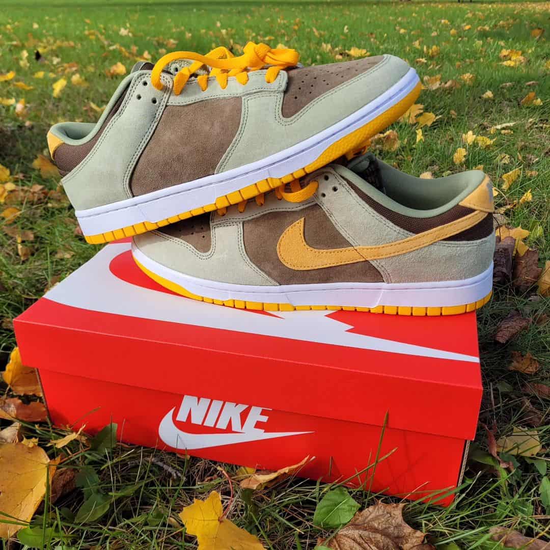 SNKRS Customer Receives “Dusty Olive” Nike Dunk Lows Without An Iconic Swoosh