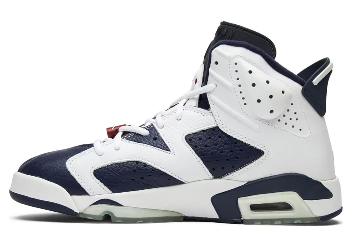 Air Jordan 6 Retro sneakers in white and navy, known for their sleek design and comfortable fit.