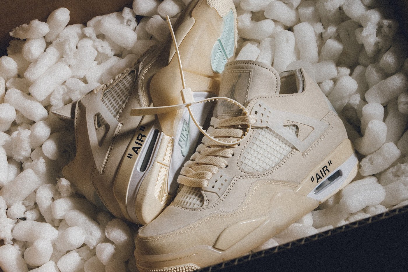 Off-White x Air Jordan 4 "Sail"