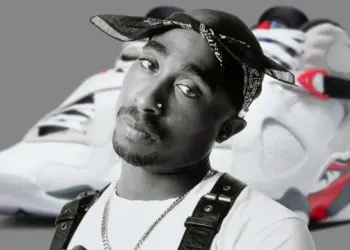 Black-and-white portrait of Tupac Shakur in a bandana, with a pair of retro sneakers blurred in the background