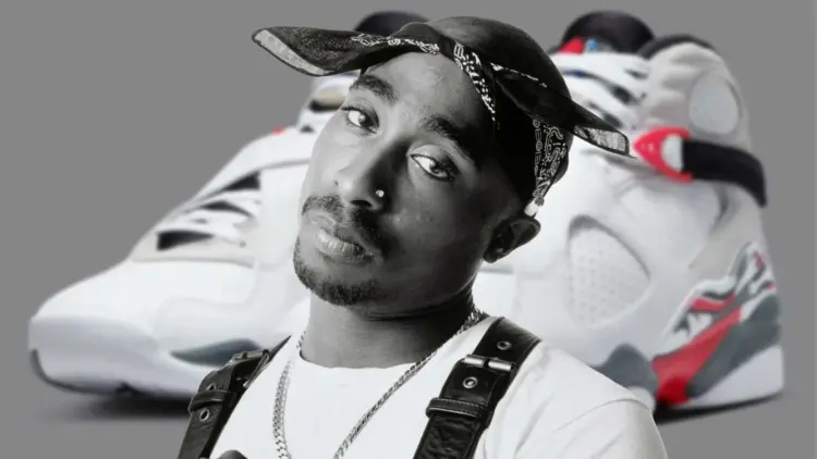Black-and-white portrait of Tupac Shakur in a bandana, with a pair of retro sneakers blurred in the background